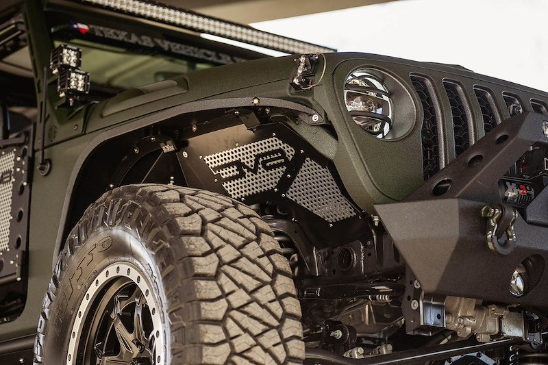 Close up of the fender on a dark green jeep