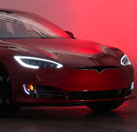 Red electric vehicle front view with LED headlights, LynXautoinnovate automotive parts USA