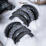Set of brake shoes on a snowy surface with 'R1CONCEPTS' branding.