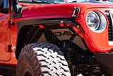 Close up on the fender on the red jeep