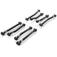 Set of eight black metal control arms on a white background