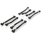Set of eight black metal control arms on a white background