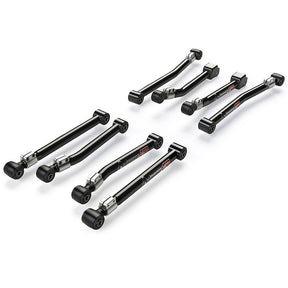 Set of eight black metal control arms on a white background